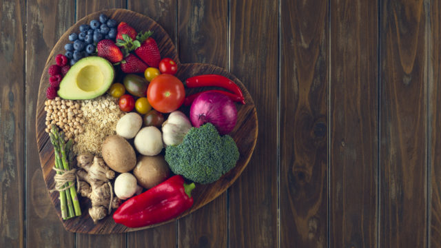 Healthy food on a heart shape cutting board